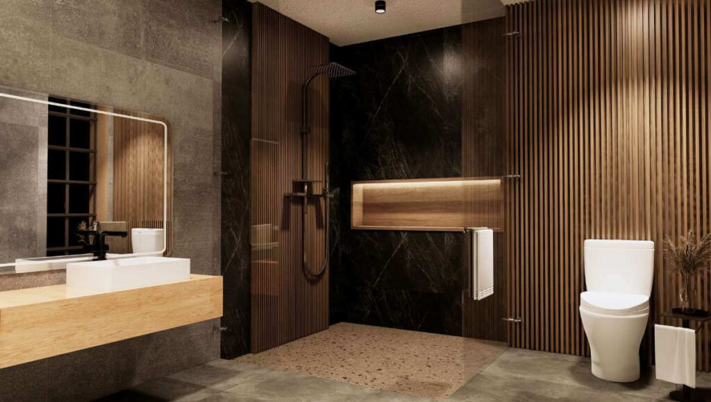 Elegancka ciemna łazienka z czarnym gresem i drewnianymi lamelami na ścianie.
